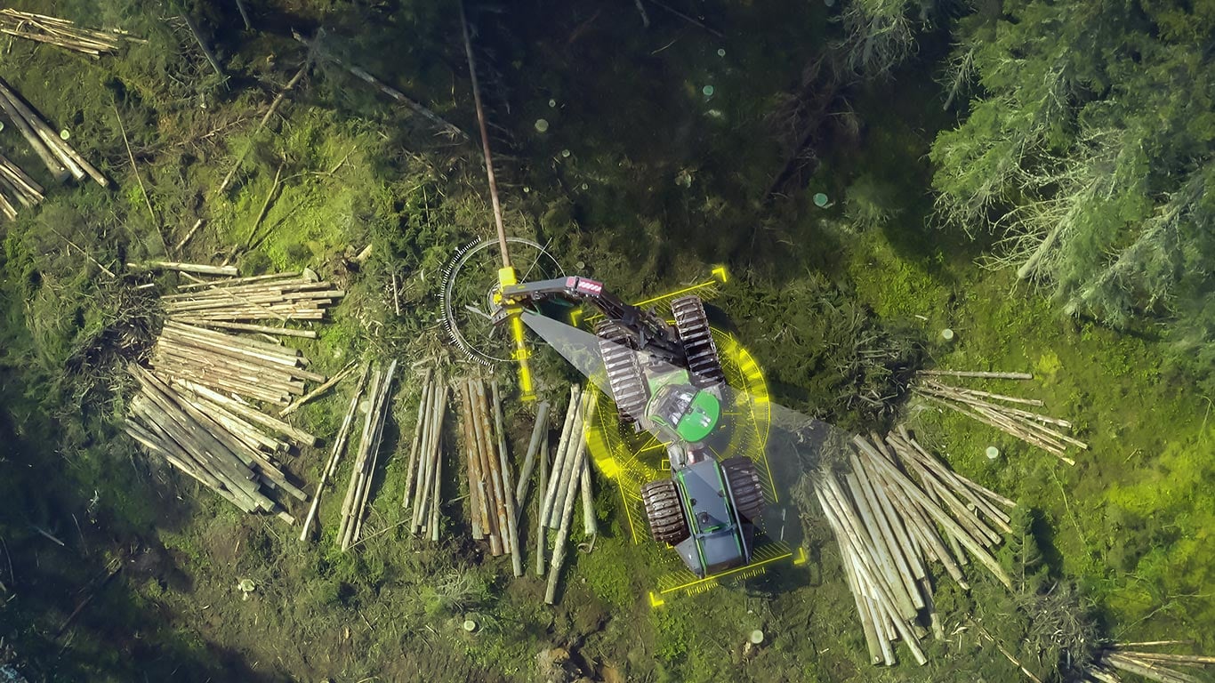 Harvester da John Deere na floresta