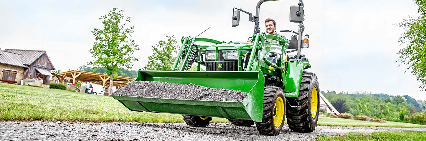 Compact utility tractor with loader